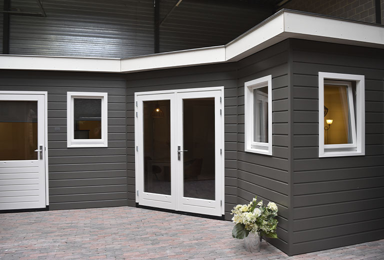 Voorbeeld van een mantelzorgwoning in hoekvorm